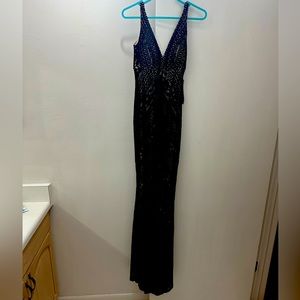 Black lace Jump apparel gown. Size 1/2. Never worn. Brand new with tags